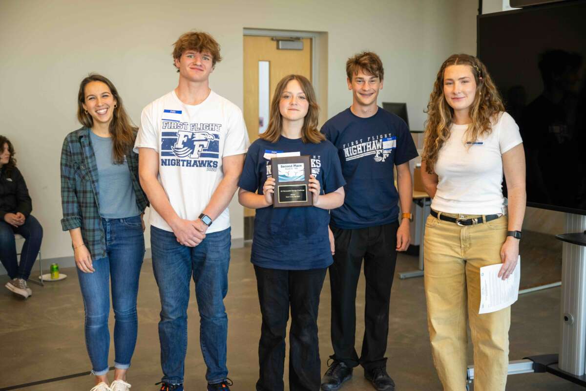 2HSOE Narwhals of the Sea FFHS 3 teens accept their award from two event coordinators.